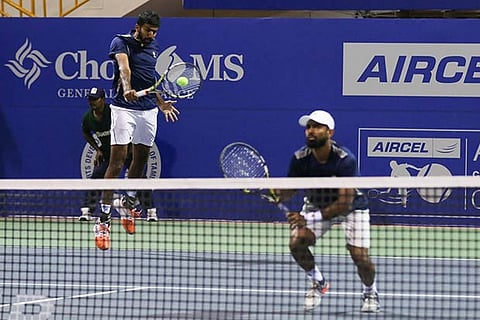Bopanna (left) and Jeevan in action
