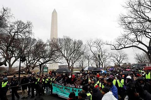 Activists march during the National Action Network's 'We Shall Not Be Moved' march in Washington DC