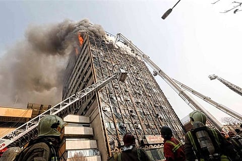 38 hurt as blazing Tehran building collapses