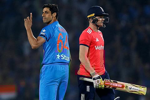 Ashish Nehra celebrates a wicket during the 2nd T20 against England