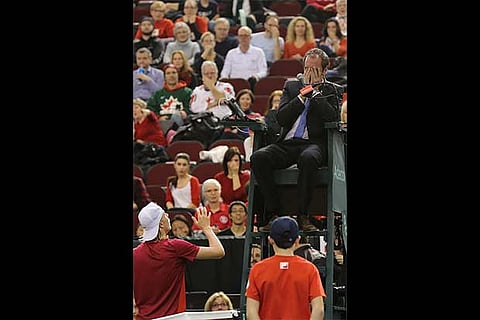 Canada?s Shapovalov hits a ball into the umpire?s face