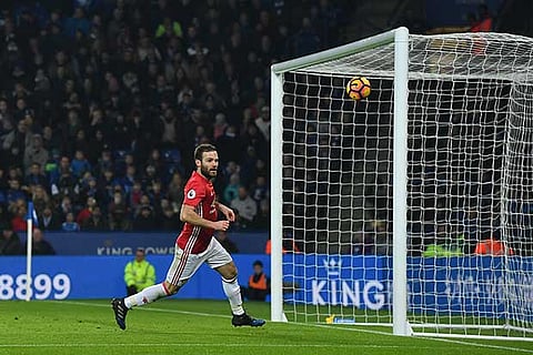 Juan Mata scores the third goal for Manchester United in the Premier League