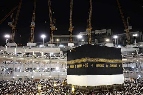 Police and pilgrims overpowered the man and escorted him away