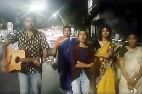 A screengrab of Sofia Ashraf and her friends walking to Poes Garden