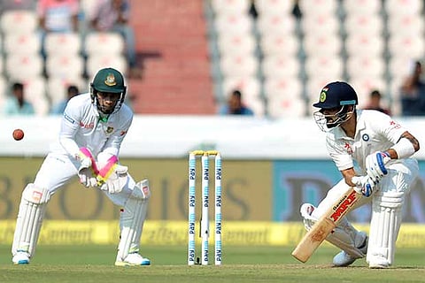 Indian captain Virat Kohli plays a shot en-route his century