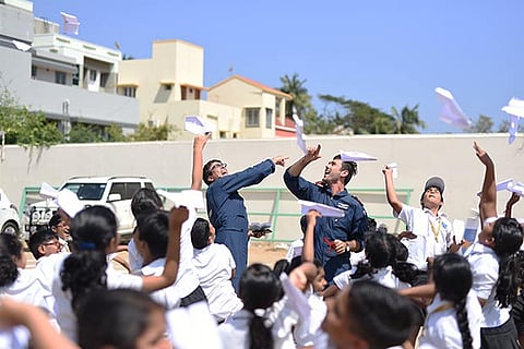 James and Dylan enjoy a fulfilling session with school kids in city