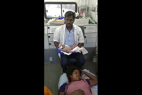 108 ambulance staff with the baby boy and Faridah