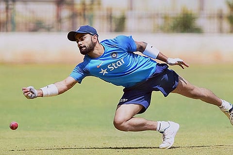 Virat Kohli during a catching practice session