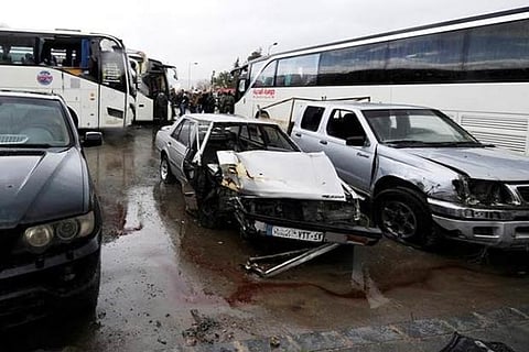 Toll in Damascus bombings jumps to 74