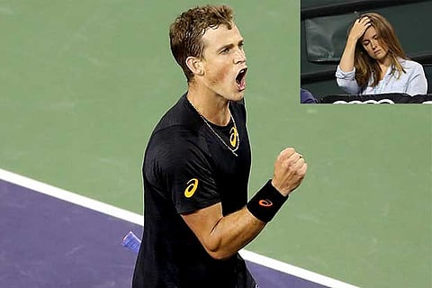 Vasek Pospisil celebrates his win. (Inset) Andy Murray?s wife Kim?s expression says it all