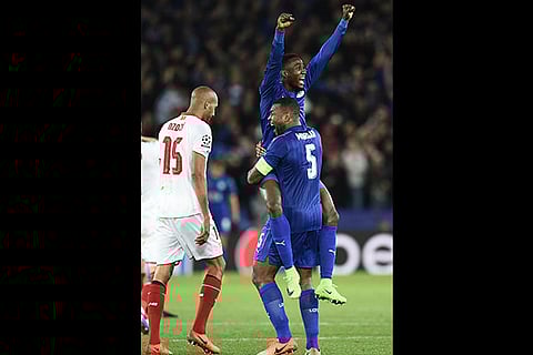 Leicester City captain Wes Morgan celebrates his team?s win