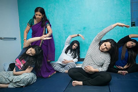 Expecting mothers at a Lamaze class in the city