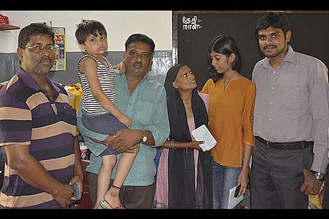 Aarthi with her family at the night shelter in Coimbatore