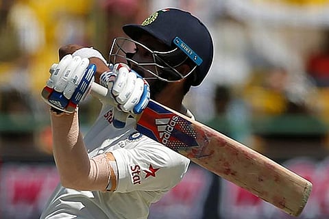 K L Rahul lofts one to the fence