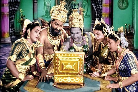 A number of characters peeking into the mirror box