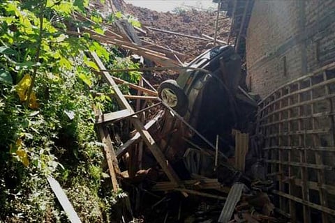 More than two dozen people were reported missing after a rain triggered a landslide