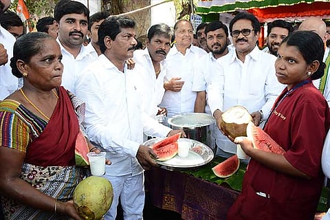A file photo of party cadre distributing refreshments to the public on the RK Nagar campaign trail