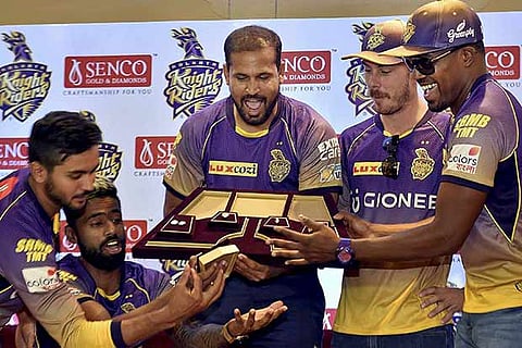 Yusuf Pathan (centre) with teammates at a KKR event