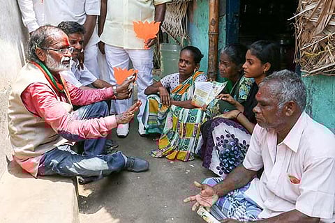BJP candidate for the bypoll to RK Nagar constituency Gangai Amaren interacting with electorate