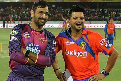 MS Dhoni (left) and Suresh Raina