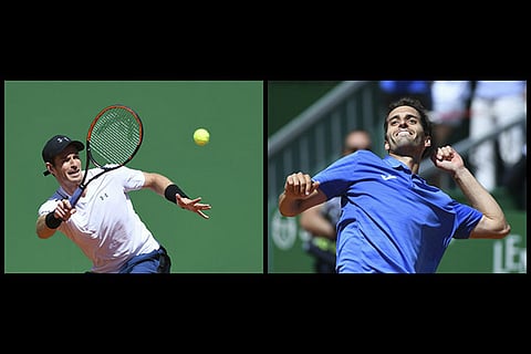 Andy Murray (left) was ousted by Albert Ramos in the third round