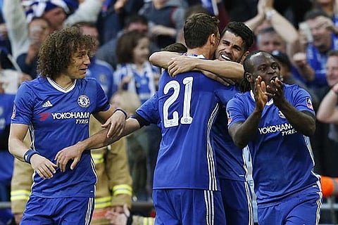 Chelsea players celebrate their win over Tottenham Hotspur in the FA Cup semi-finals