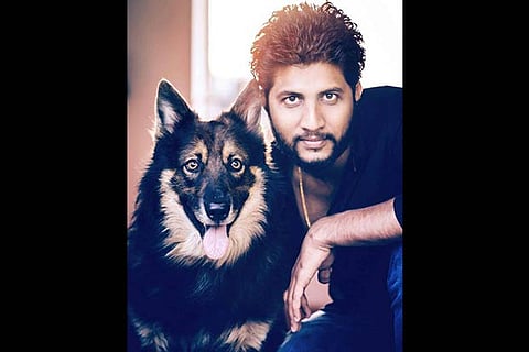 Nithin with his pet dog Max