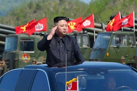 North Korea's leader Kim Jong Un watches a military drill marking the 85th anniversary