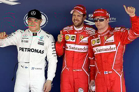 Valtteri Bottas, Sebastian Vettel and Kimi Raikkonen at the end of the qualifying session