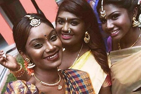 Photo of three ?dusky? women a hit for the right reasons