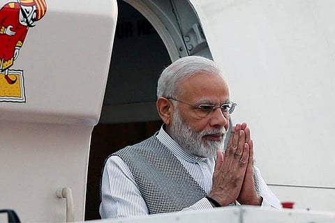 PM Narendra Modi gestures as he arrives for the United Nations Vesak Day celebrations in Sri Lanka