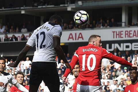 Victor Wanyama (left) scores Tottenham?s first goal with a header
