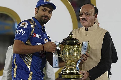 MI captain Rohit Sharma with the winners? trophy after they won the final against RPS