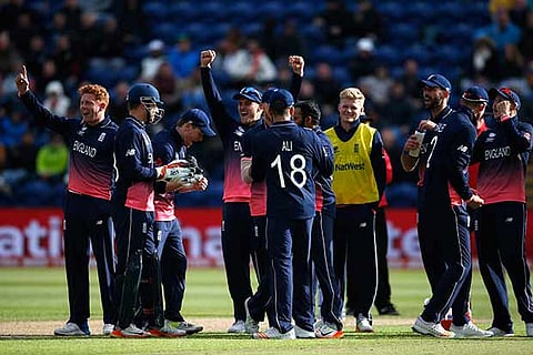 England celebrates its win over New Zealand on Tuesday