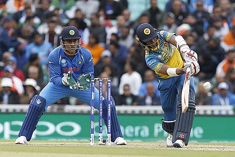 Sri Lanka?s Kusal Mendis hits a six to reach his half century during the match