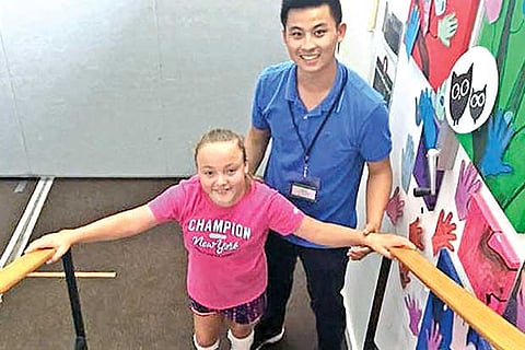 11-year-old girl with cerebral palsy climbs Great Wall of China