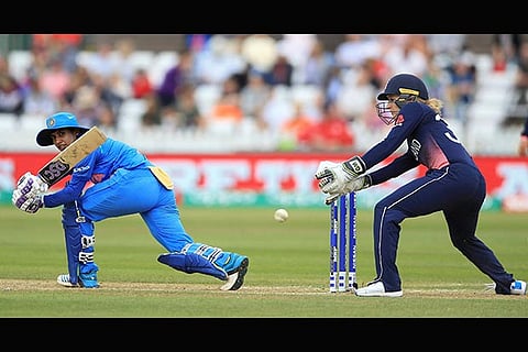 India's Mithali Raj, and England's Sarah Tayor during the ICC Women's World Cup fixture