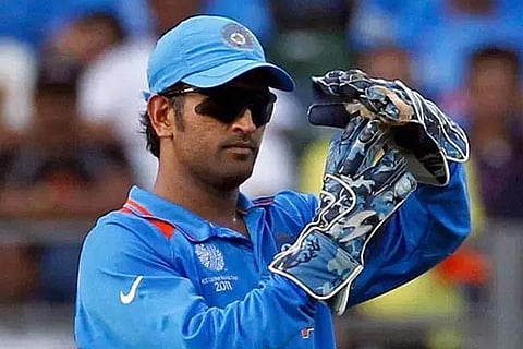 File photo of MS Dhoni using the DRS system