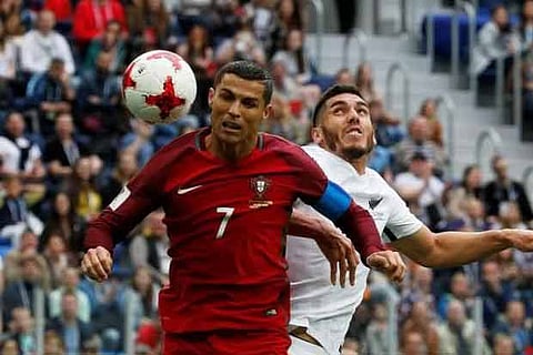 Portugal?s Cristiano Ronaldo heads at goal during New Zealand v Portugal match