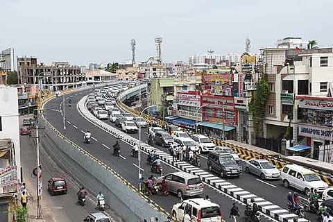 Vehicles ride over the newly inaugurated flyover