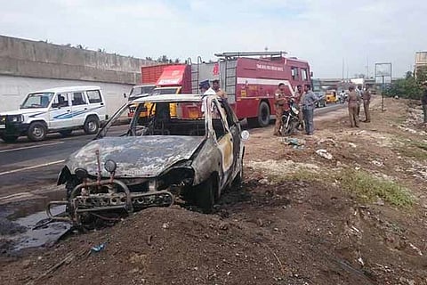 The car that was destroyed in fire near the BSNL office at Poonamallee