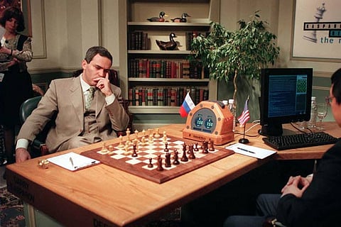 Man vs Machine: Garry Kasparov waiting to make his move against IBM supercomputer Deep Blue, 1996