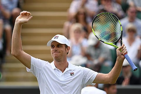United States? Sam Querry exults after beating France?s Jo-Wilfried Tsonga