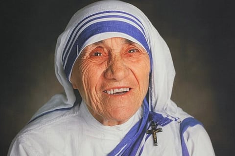 St Teresa?s famed blue-border sari is a trademark