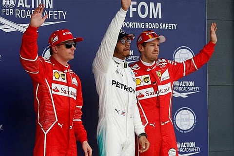 (L to R) Kimi Raikkonen, Lewis Hamilton and Sebastian Vettel