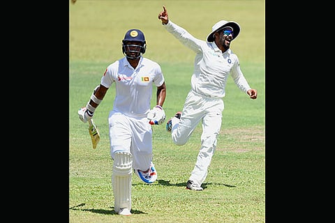 Ravindra Jadeja celebrates after he ran out Sri Lanka Board President?s XI?s Danushka Gunathilaka
