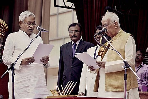 Bihar Governor Keshari Nath Tripathi administers oath to JD(U) National President Nitish Kumar