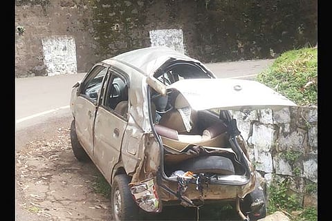 Mangled remains of the car that was involved in the accident at Udhagamandalam