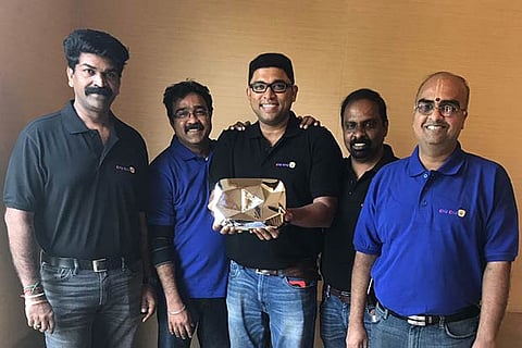 C Vinoth Chandar, CEO, ChuChu TV (centre) and his team with the YouTube Diamond Play Button
