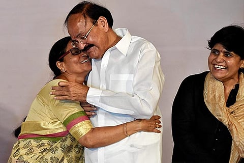 Venkaiah Naidu being greeted and his wife Usha witjh daughter Deepa Venkat after elected as VP.(PTI)